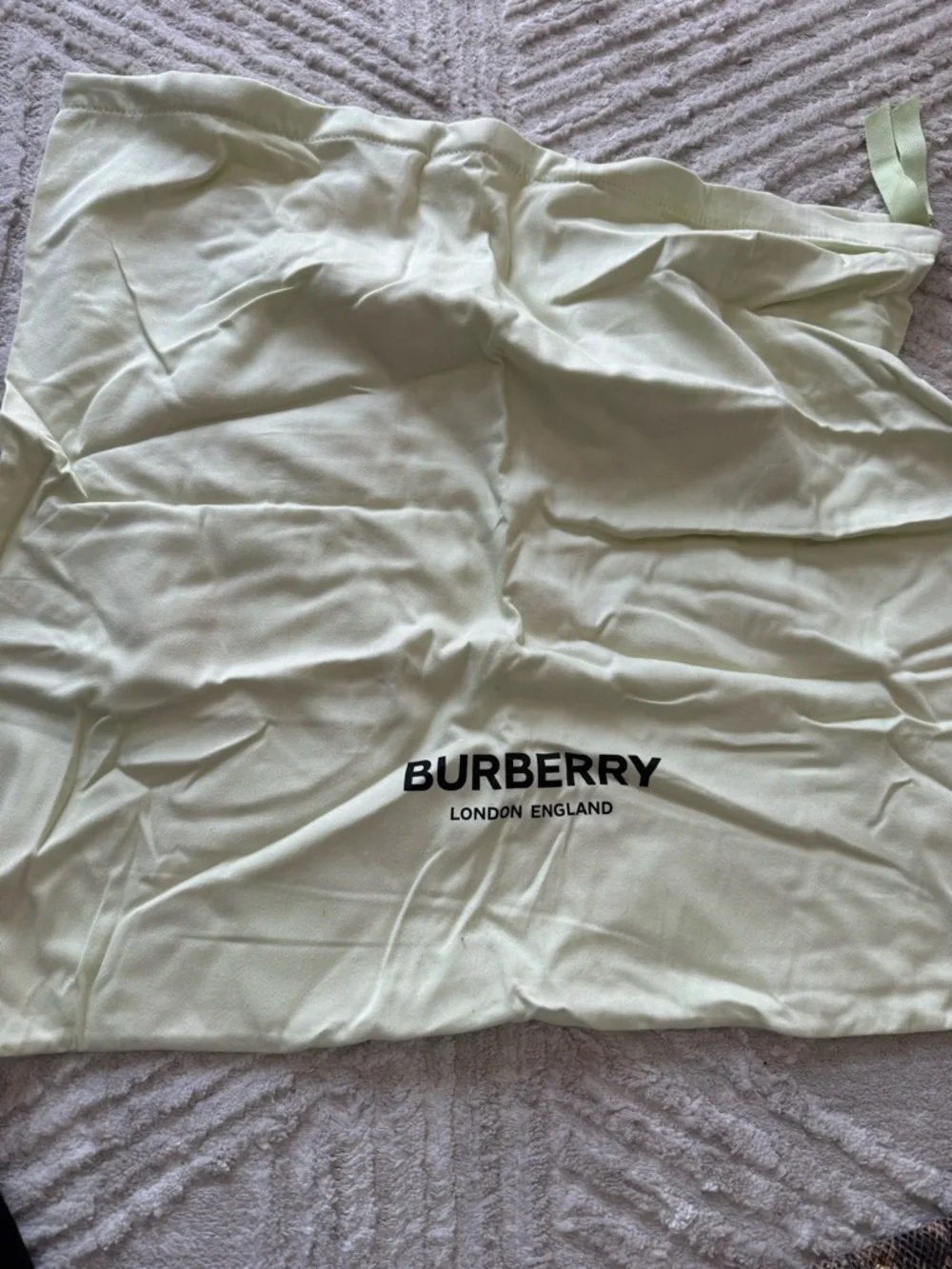 Burberry Beige Check Messenger Bag with Black Trim and Red Accent